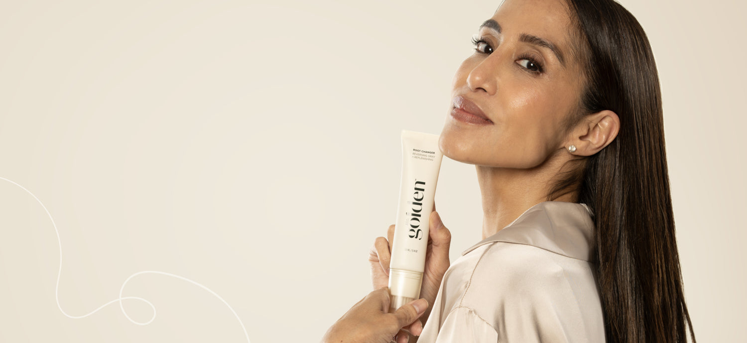 Woman holding root changer